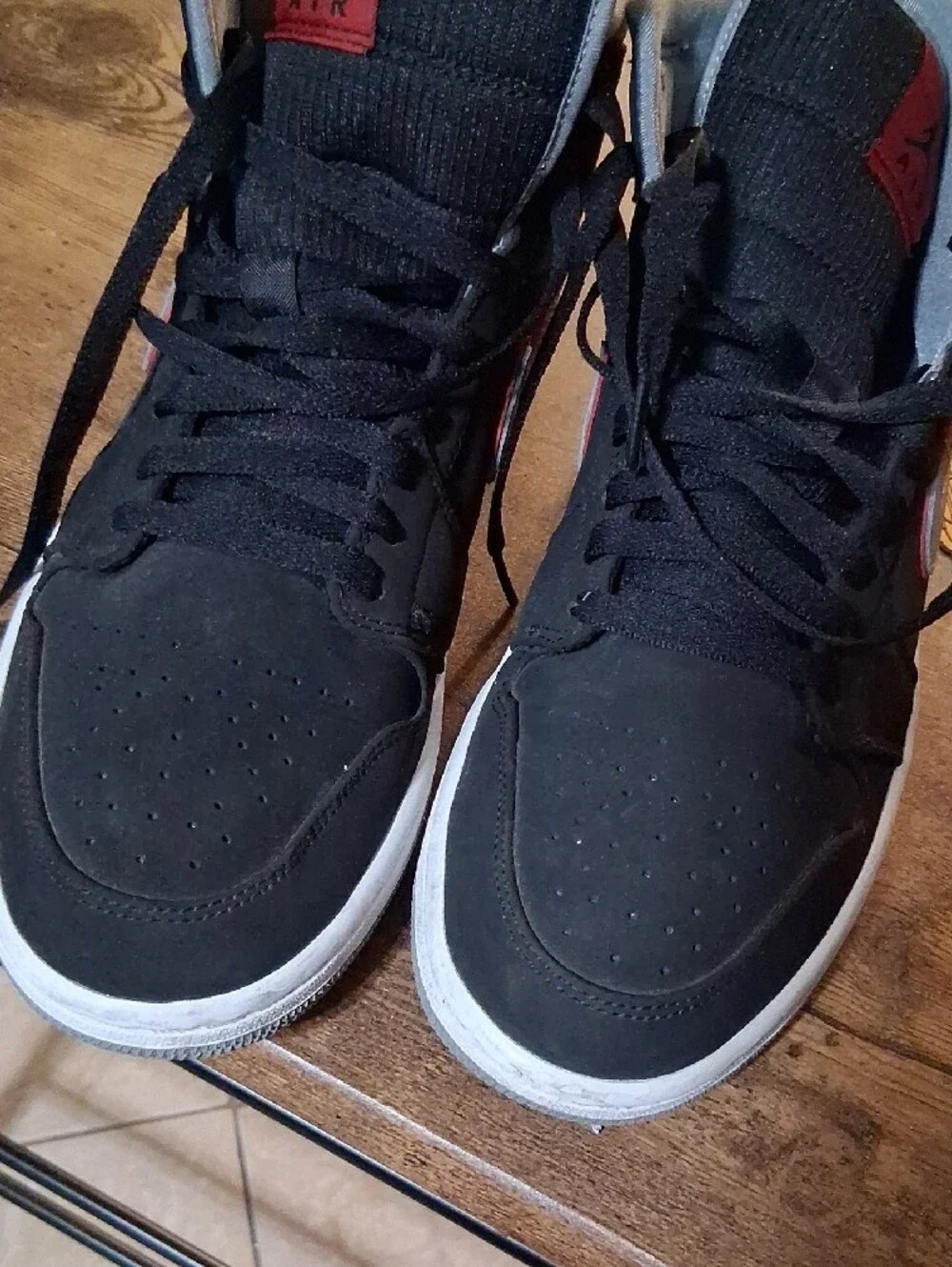 Jordan Mid-Top Athletic Sneakers in Black, Gray and Red Accents